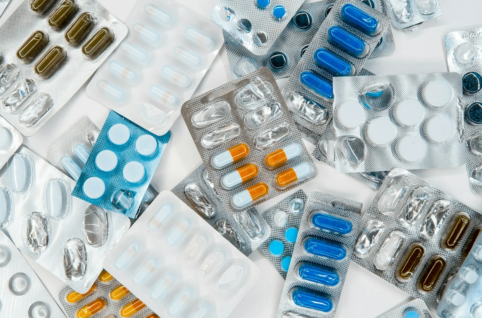 Prescription medication and cost paperwork side by side